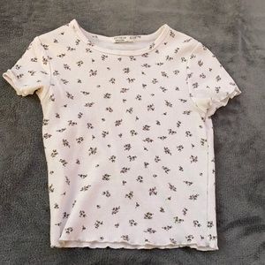 Floral white tee shirt with ruffled sleeves